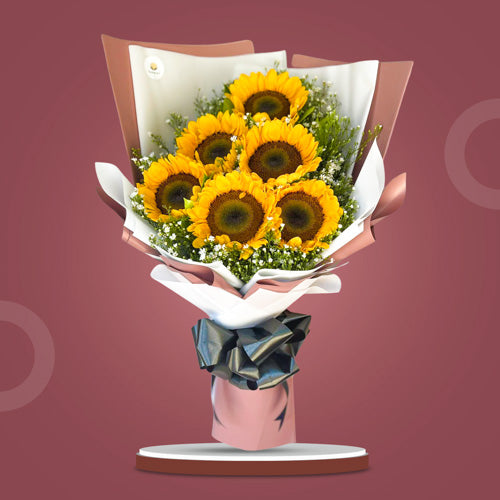 Sunny delight: Bouquet of 6 vibrant sunflowers accompanied by Aster fillers, wrapped in Korean style with a satin ribbon, exuding joy and radiance. Perfect for delivery to Intramuros Golf Club and Paco Park.