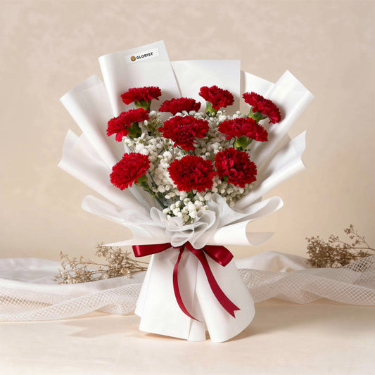 Red carnation bouquet with gypsophila baby’s breath and Korean wrapping
