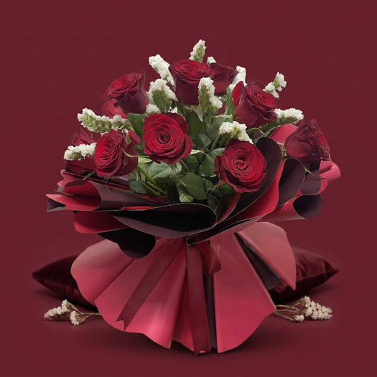 Aurora Flora bouquet with 12 red China roses and white statice wrapped in maroon and wine red Korean paper with maroon ribbon