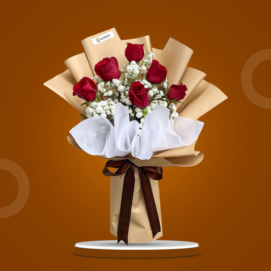 Blissful Dreams bouquet with 6 red Philippine roses and gypsophila in kraft and white wrap with brown ribbon