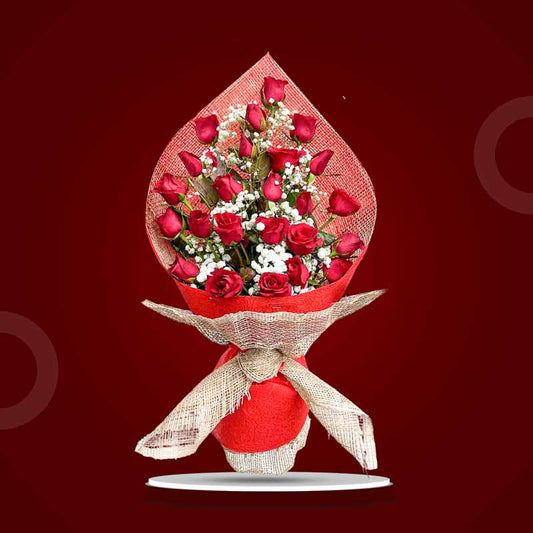 Blossom Dreams bouquet with 24 red Philippine roses and gypsophila wrapped in red tissue and burlap