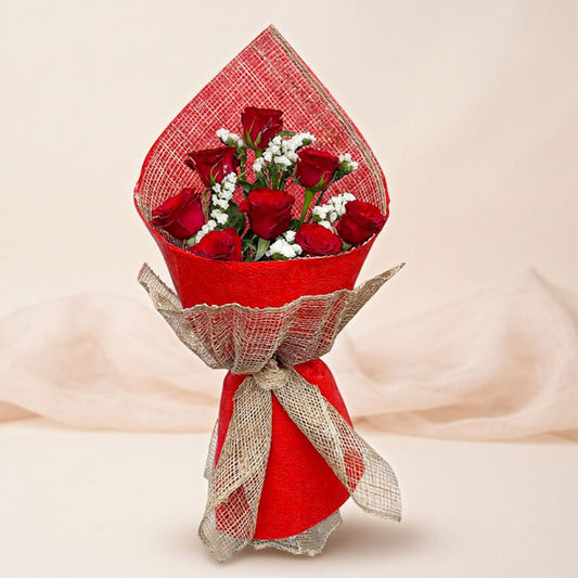 Blossom Flora bouquet with 8 red China roses and baby’s breath in burlap and red tissue wrap