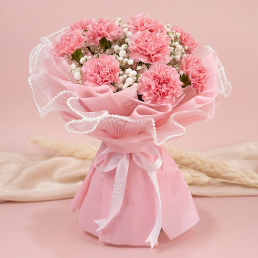 Light pink carnation bouquet with gypsophila baby’s breath