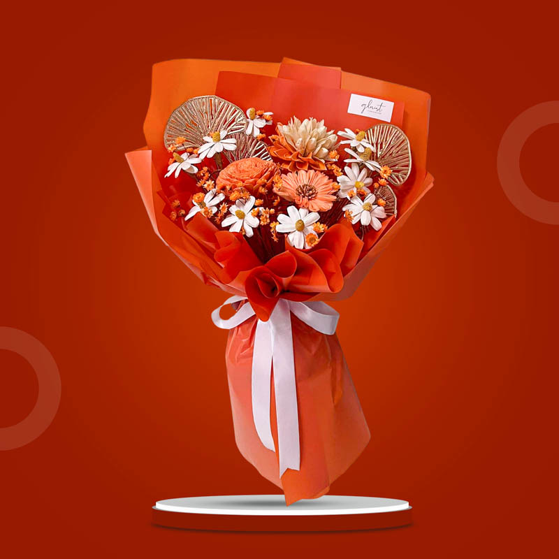 Carbide Timeless dried flower bouquet with orange sola chrysanthemum, ginkgo gold leaf, dried gerbera, and neutral botanicals