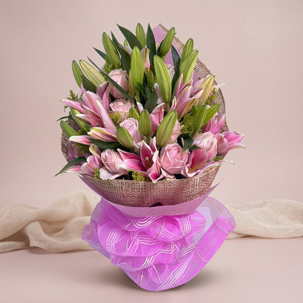 Stargazer lily bouquet with pink China roses and golden rod fillers