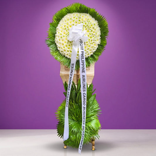 Circle Memory Funeral Stand with Malaysian mums, green line and anahaw leaves — sympathy tribute for Metro Manila