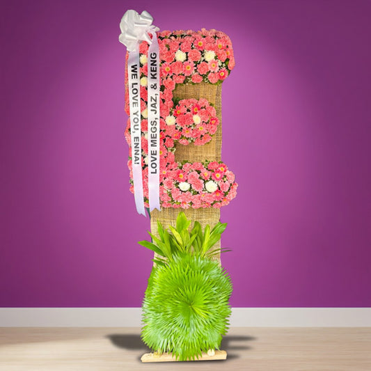 Comforting Memory Sympathy Stand with elegant flowers and greenery for a heartfelt tribute