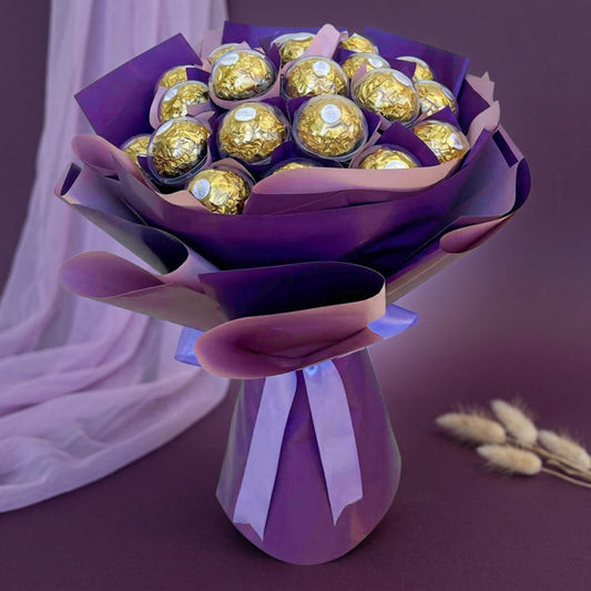 Divine Sweets chocolate bouquet with 24 Ferrero Rocher chocolates in two-tone purple wrap and lavender ribbon