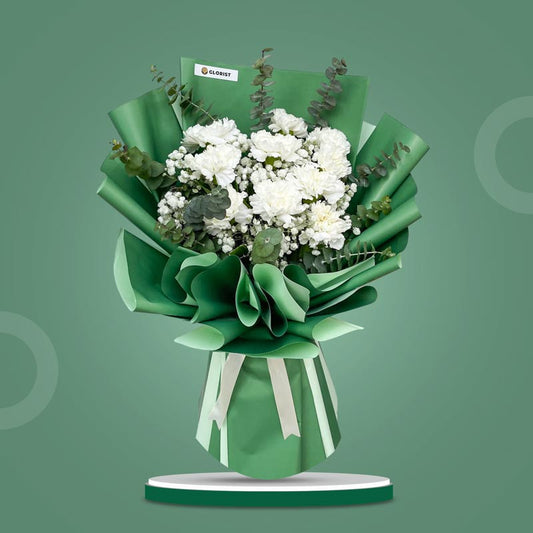 Elite Radiance bouquet with white carnations, eucalyptus, and baby’s breath in green Korean wrap with cream ribbon