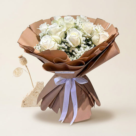 Encouraging Flora bouquet with 12 white China roses and gypsophila fillers in Korean wrap with white ribbon — same-day delivery Manila