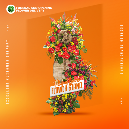 Fabulous Launch Inaugural Stand with red anthurium, gerbera daisies, stargazer lilies, jaguar flowers, bird-of-paradise, and green and yellow buttons