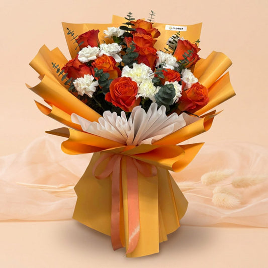 Orange China rose and white carnation bouquet with eucalyptus