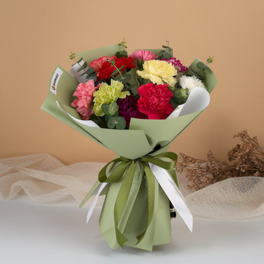 Assorted carnation bouquet with eucalyptus fillers and green wrapping