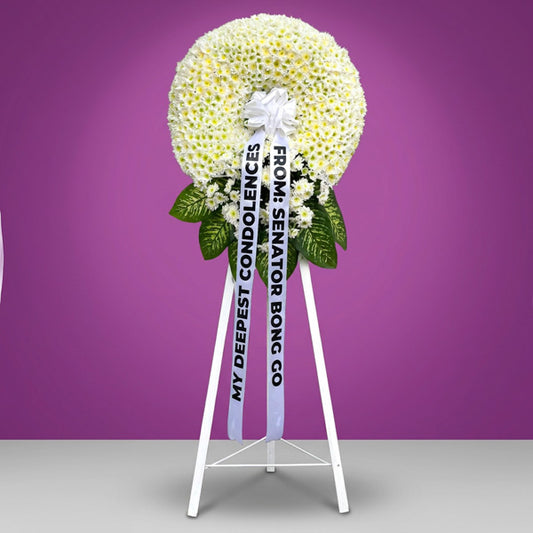 Free Memory Funeral Stand with elegant blooms and greenery for funeral tributes