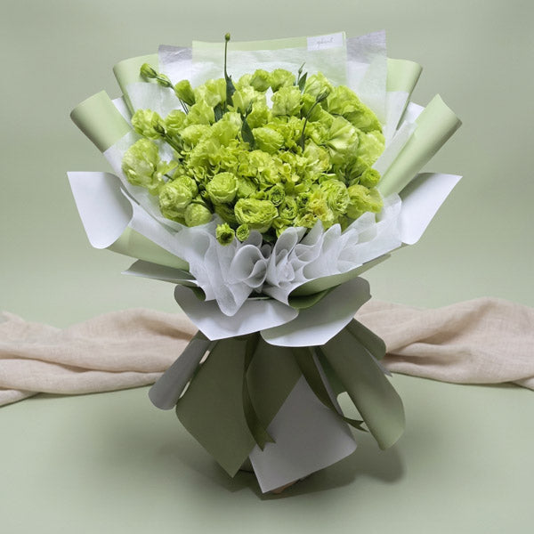 Green lisianthus bouquet with preserved hydrangea and Korean-style wrapping