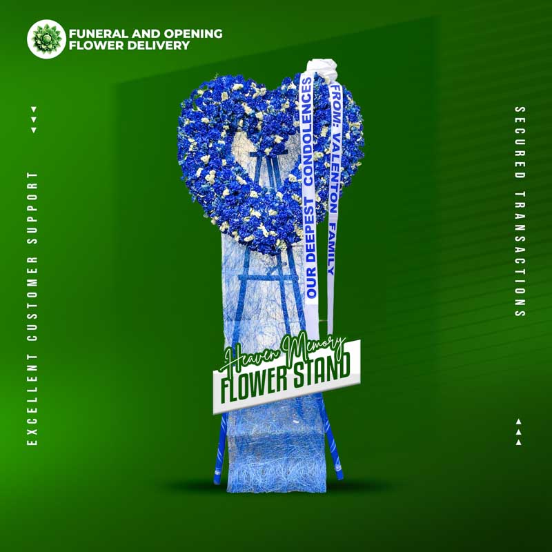Heaven Memory Heart Funeral Stand with blue carnations and white statice flowers, sympathy floral arrangement