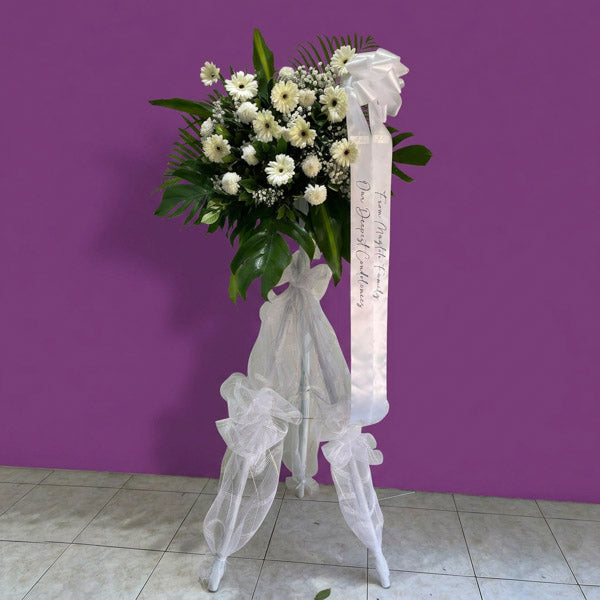 White gerbera and chrysanthemum funeral flower stand arrangement