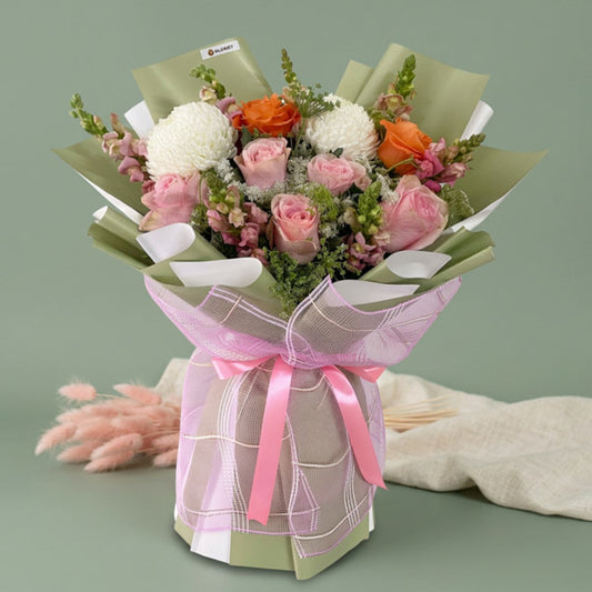 Peach Ecuadorian rose bouquet with pink China roses and sunlight flowers