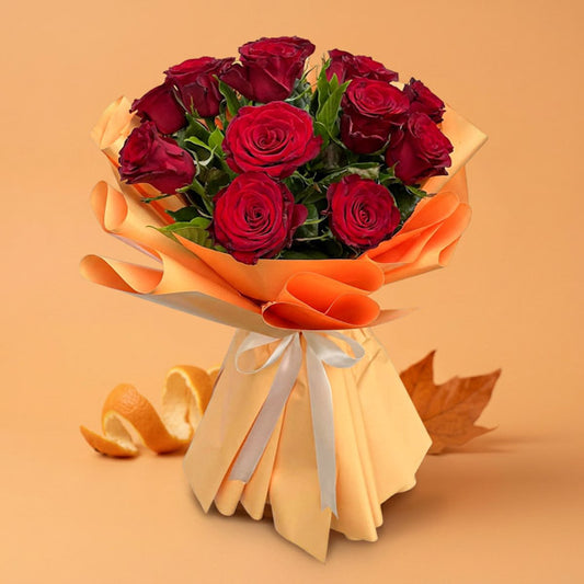 Keen Flora bouquet with 15 red China roses in a yellow-orange wrap tied with a cream ribbon