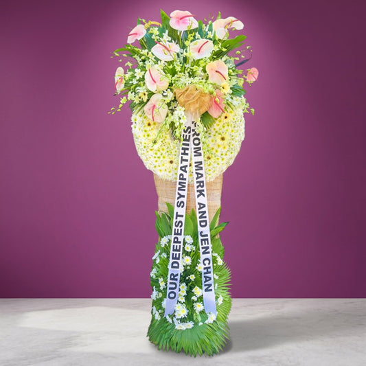 Lasting Memory Wreath Stand with 12 white anthuriums, 7 white gerberas, orchids and Malaysian mums accented by green line and anahaw leaves for Metro Manila memorials