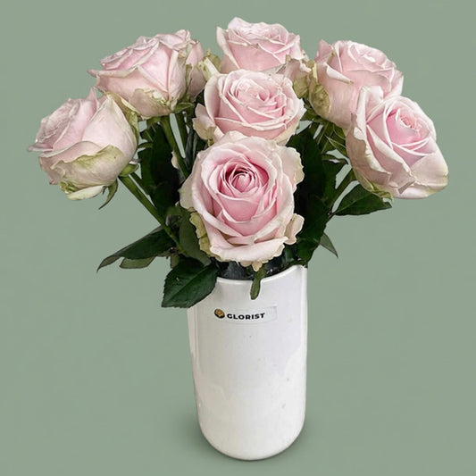 Ten light pink China roses in a minimalist white glass vase, a soft romantic and housewarming flower gift with same-day Metro Manila delivery