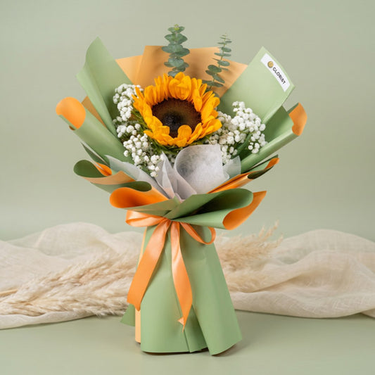 Minimalist sunflower bouquet with eucalyptus and baby’s breath in Korean-style wrapping