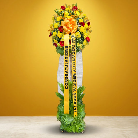 Noble Launch Inaugural Stand with vibrant blooms and greenery for grand openings and celebrations