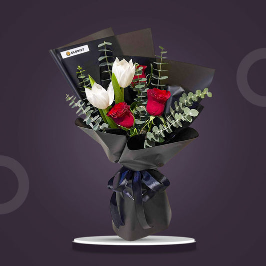 Onyx Love bouquet with white tulips, red China roses, and eucalyptus Baby Blue, wrapped in black Korean paper with black ribbon — same-day delivery Manila