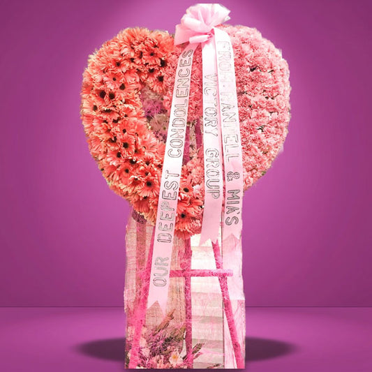 Outstanding Memory Funeral Stand with pink carnations and pink gerberas arranged for a sympathy tribute in Metro Manila