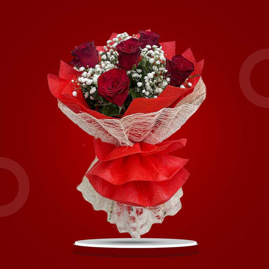 Passion Flora flower bouquet with red China roses, baby’s breath, wrapped in red tissue and burlap