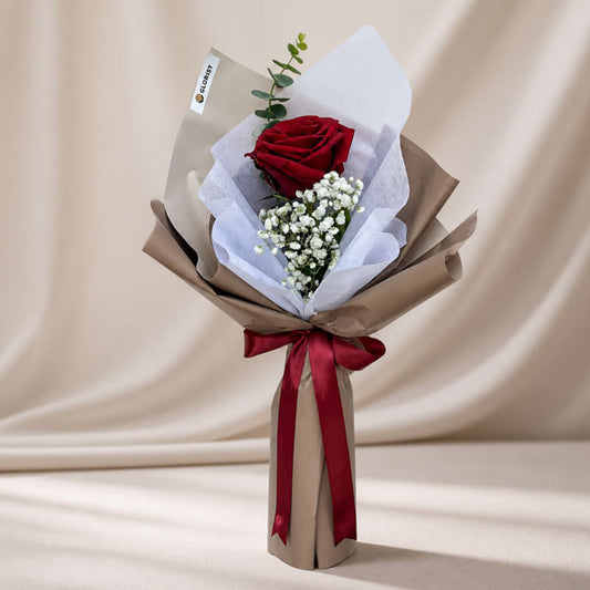 Pleasant Dreamland bouquet with red Ecuadorian rose, baby’s breath and eucalyptus wrapped in café-toned paper with maroon ribbon for Metro Manila delivery