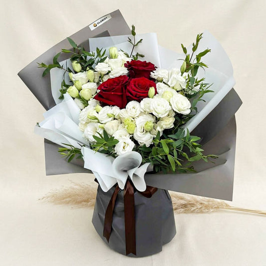Premium bouquet with Ecuadorian roses, white lisianthus, and eucalyptus fillers