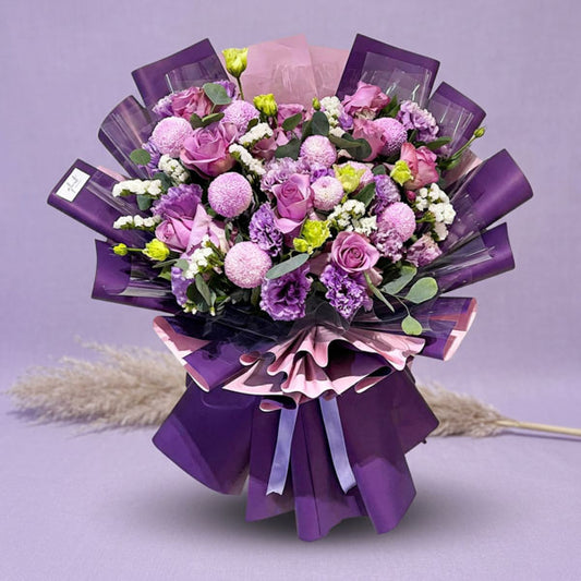 Purple China roses bouquet with lisianthus, pompom chrysanthemums, and eucalyptus fillers