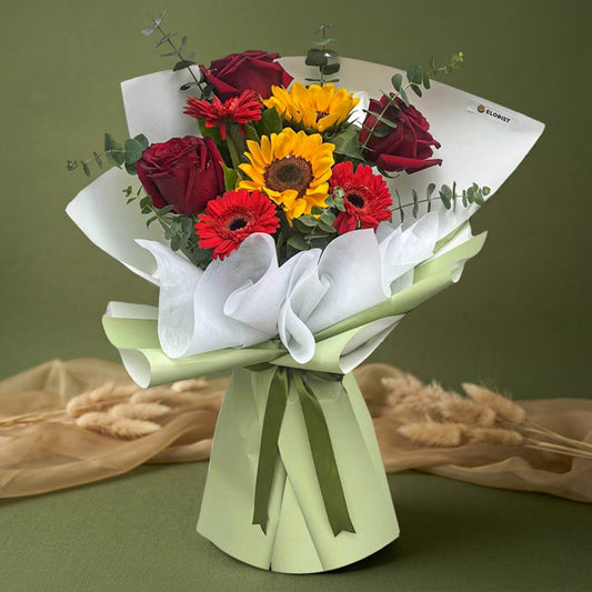 Red Ecuadorian rose and sunflower bouquet with eucalyptus fillers