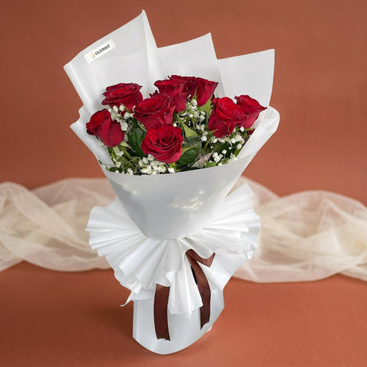 Sky Flora bouquet with 10 red China roses and gypsophila baby’s breath in white Korean wrap with brown ribbon