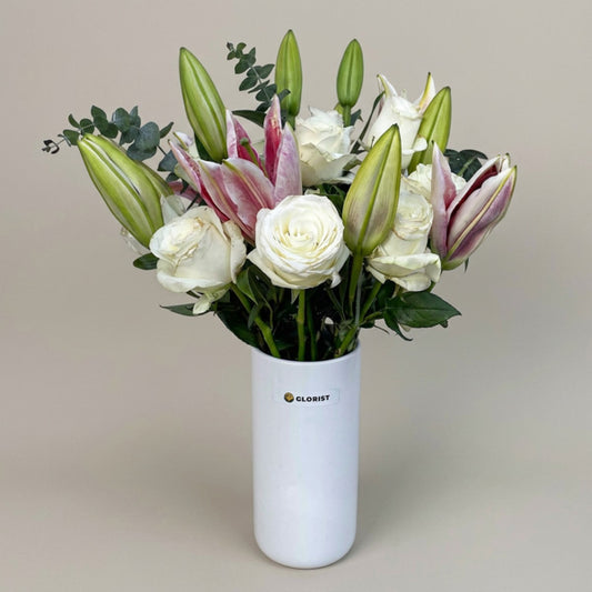 Sparkly Fresh Flower Vase with stargazer lilies, white China roses, and eucalyptus baby blue in a white glass vase, same-day delivery in Metro Manila