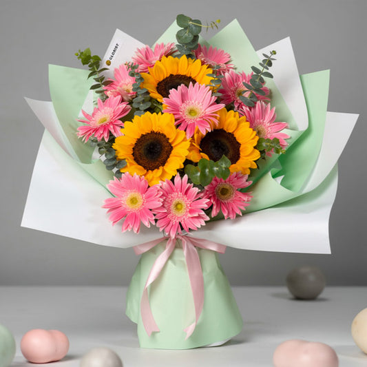 Sunflower and pink gerbera bouquet with eucalyptus and Korean-style wrapping