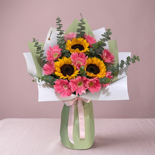 Sunflower and pink gerbera bouquet with eucalyptus and Korean-style wrapping