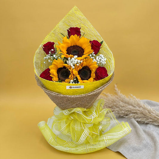 Sunflower and red imported rose bouquet with baby’s breath and burlap wrapping