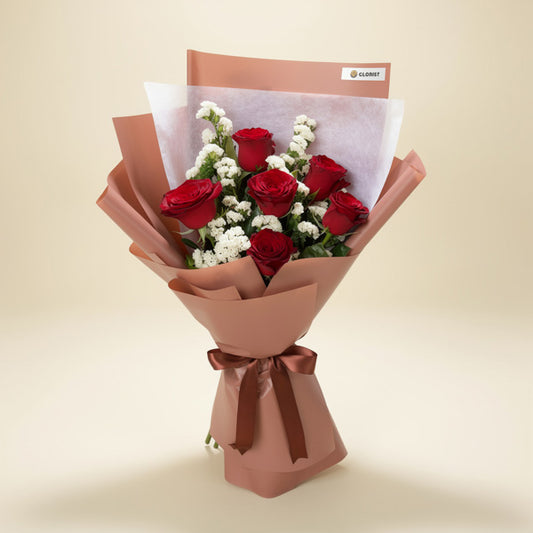 Tender Flora bouquet with 6 red China roses and white statice in bean brown and white wrap with brown ribbon