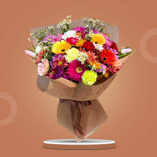 Thumbelina Love Flower Bouquet with assorted gerbera, carnation, mums, tulips, and egg aster