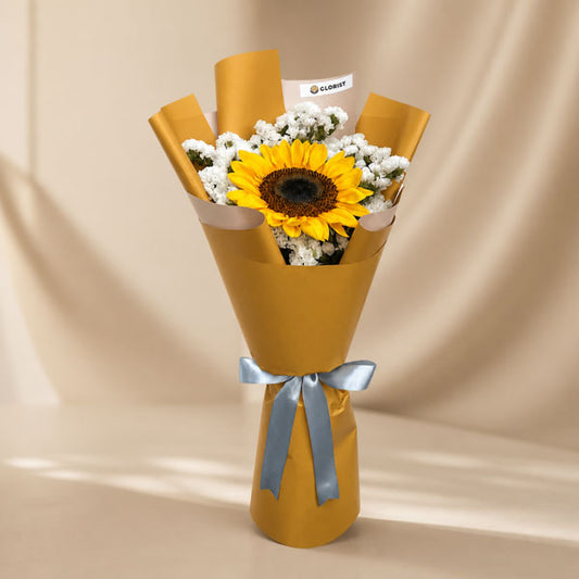 Upbeat Summer bouquet with sunflower and statice in mustard yellow Korean wrap and silver ribbon