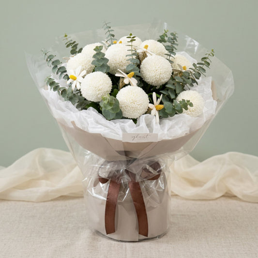 White pompom chrysanthemum bouquet with eucalyptus and Korean-style wrapping