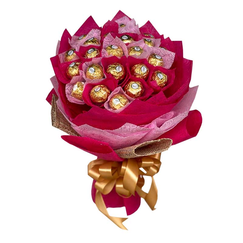 A delightful bouquet of a dozen Ferrero Rocher chocolates, beautifully wrapped in a combination of rustic tissue and burlap. This exquisite arrangement is finished with a luxurious satin ribbon, making it a perfect and charming gift for any occasion. Indulge in the irresistible combination of chocolate and elegance with this delightful presentation.
