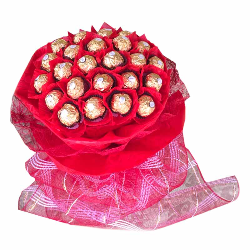 Indulgent bouquet: 24 Rocher Ferrero chocolates beautifully wrapped in tissue and abaca, presented with a charming net. A sweet delight.